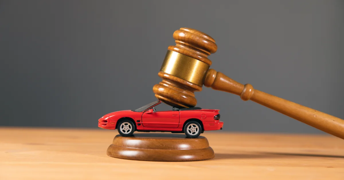 Judge gavel and car model